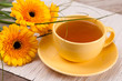 tea with cake and gerberas flowers