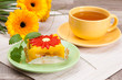 tea with cake and gerberas flowers