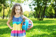 Little girl in summer park