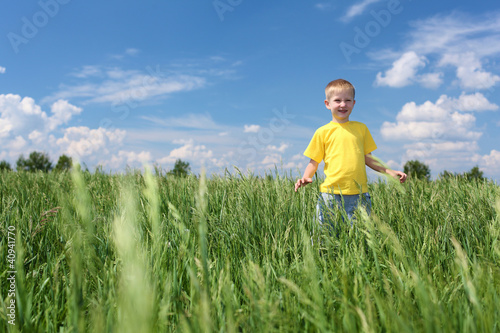 Photo: little boy outdoors little boy outdoors