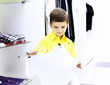 Photo: Little boy doing shopping Little boy doing shopping