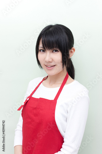 Photo: エプロンをした女性 エプロンをした女性