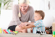 Woman watching her son playing