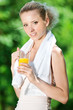 Woman drinking juice after exercise Woman drinking juice after exercise