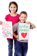 Two kids with greetings for mum