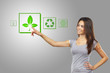 Young businesswoman pointing  recycle symbol, isolated