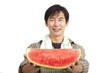 middle age asian farmer holding Watermelon isolated on white middle age asian farmer holding Watermelon isolated on white