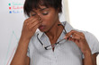 pretty black woman having migraine