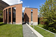 modern bricks house, surrounded by nature