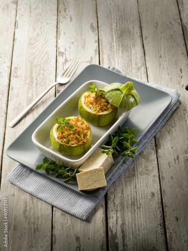 Photo: Zucchinis stuffed with tofu cheese, vegetarian food Zucchinis stuffed with tofu cheese, vegetarian food