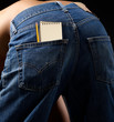 A blank notebook & pencil in jeans pocket
