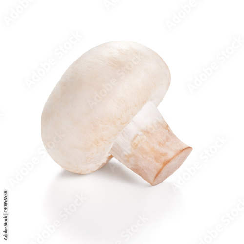 Photo: Fresh Mushrooms champignon Isolated on a white background Fresh Mushrooms champignon Isolated on a white background