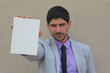 White empty sign holded by a businessman