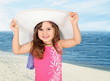 Little Girl in White Beach Hat