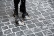 horse legs detail on cobblestone
