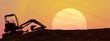 Excavator by sunset