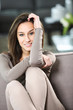 portrait of young attractive woman at home