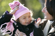 Mom and daughter outside on a winters day