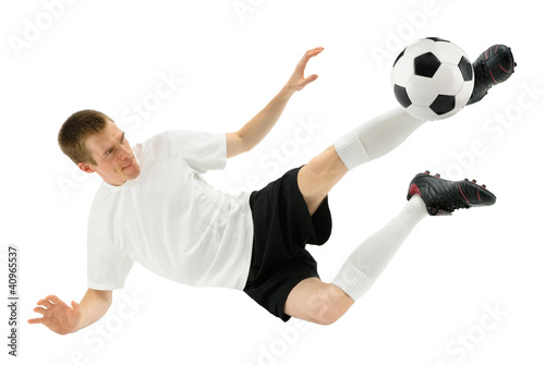 Photo: Fußballer zeigt einen gekonnten Schuss Fußballer zeigt einen gekonnten Schuss