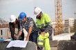 bricklayers outdoors with foreman