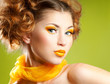 Beautiful woman with bright creative citrus yellow makeup Beautiful woman with bright creative citrus yellow makeup