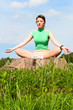 young woman in meditation pose young woman in meditation pose