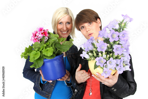 Foto: Frauen mit Topfflanzen Frauen mit Topfflanzen