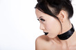 Profile of asian female with creative black makeup Profile of asian female with creative black makeup