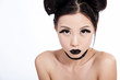 Young asian female with creative black makeup Young asian female with creative black makeup