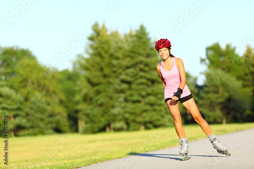 Photo: Skating woman on rollerblades Skating woman on rollerblades