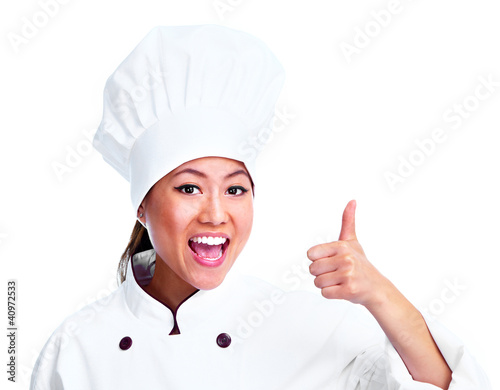 Photo: Young chinese chef woman. Young chinese chef woman.