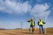 Geodesist two man equipment on construction site