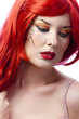 Red haired tattooed woman over white background Red haired tattooed woman over white background