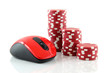 On line gaming and gambling concept, a mouse and casino chips