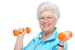 Attractive senior woman at health club