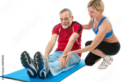 Photo: Senior man doing fitness exercise Senior man doing fitness exercise