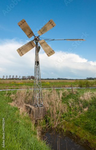 Photo: Turning old metal windmill Turning old metal windmill