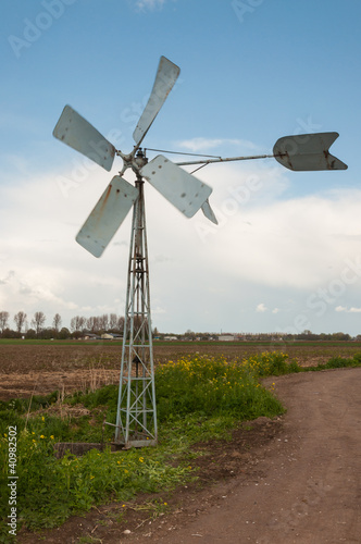 Photo: Running old metal windmill Running old metal windmill