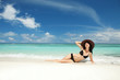 Happy fashion woman rest on the beach