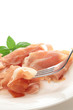 Uncured ham on fork