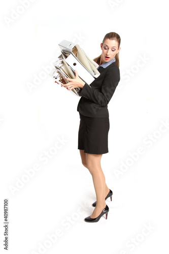 Photo: Frau mit Aktenordnern Frau mit Aktenordnern