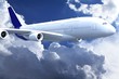 Airplane above the clouds
