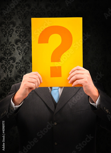 Photo: Businessman questioning Businessman questioning