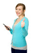 Foto: Woman with digital tablet and thumbs up Woman with digital tablet and thumbs up