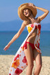 Carefree young woman on the beach