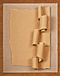 old textured cardboard sheet with torn edges wooden background old textured cardboard sheet with torn edges wooden background