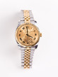 Photo: Gold and stainless steel mans watch Gold and stainless steel mans watch