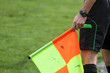 soccer referee hold the flag
