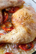 Roast chicken with tomato and onion