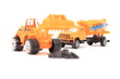 Yellow bulldozer loading stones